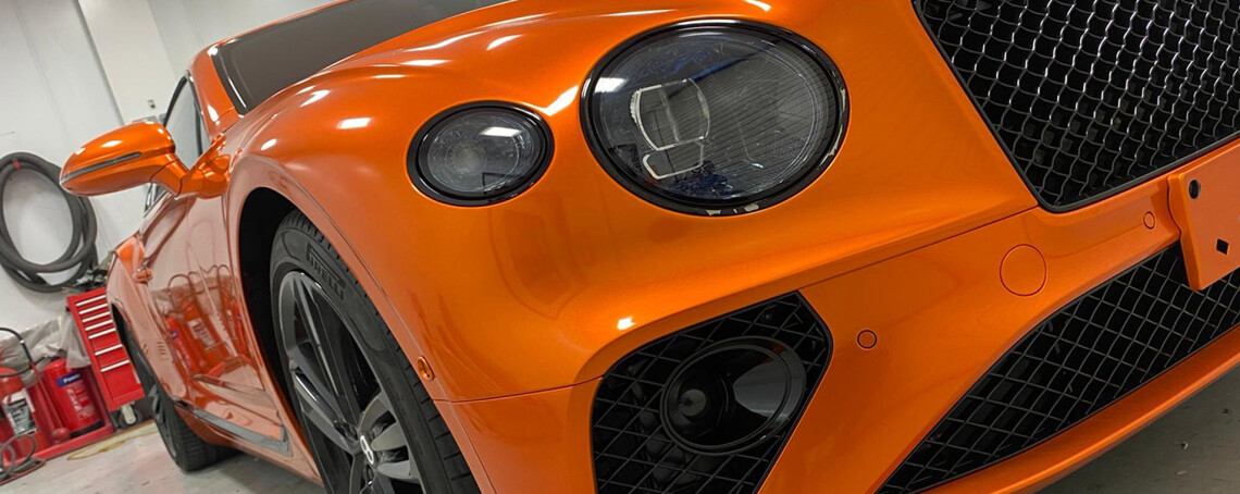 Bentley GT wrapped in gloss metallic orange